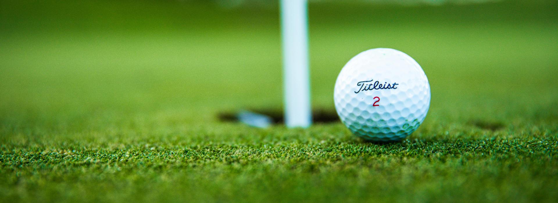 Golf ball near hole